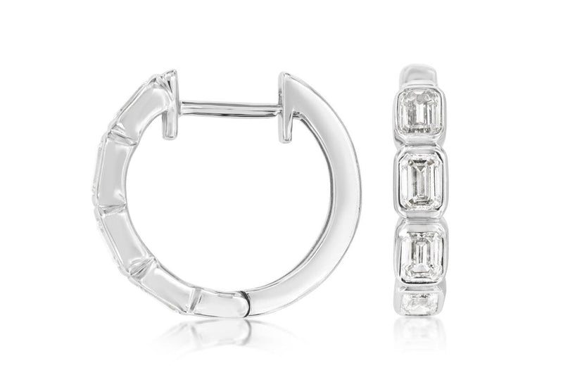 Discover the ultimate blend of modern elegance with our 14K White Gold Bezel Diamond Hoops. Each precisely cut diamond, securely set in a sleek bezel, captures and reflects light with dazzling brilliance, illuminating your every movement.  These exquisite